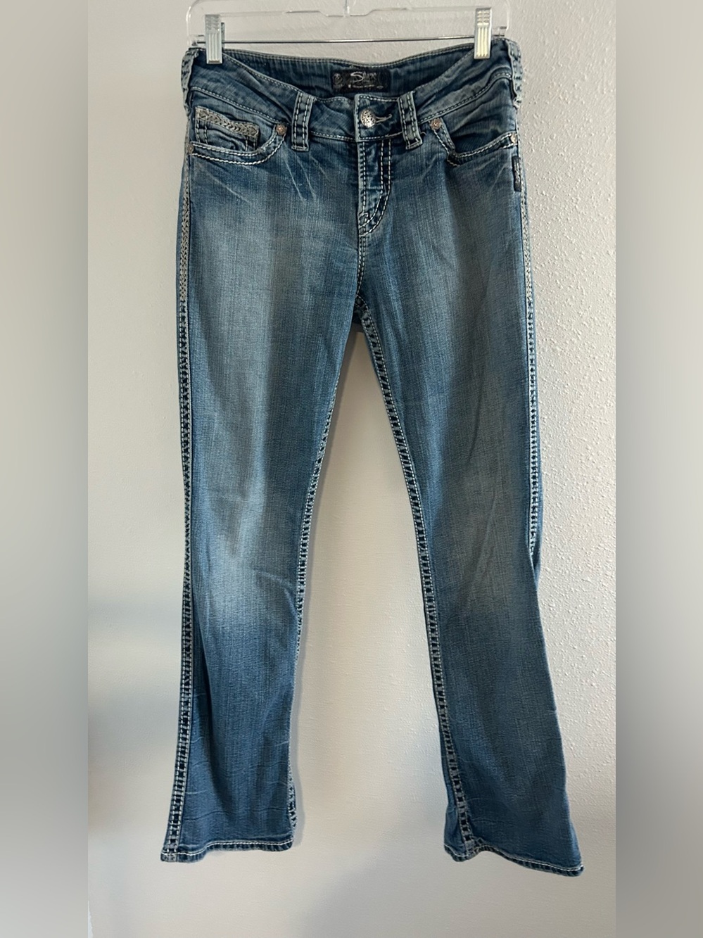 Silver Jeans Women's Faded Blue Boot Cut Jeans